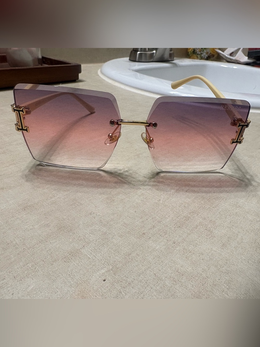 Pink Gradient Rimless Sunglasses with Gold Accents
